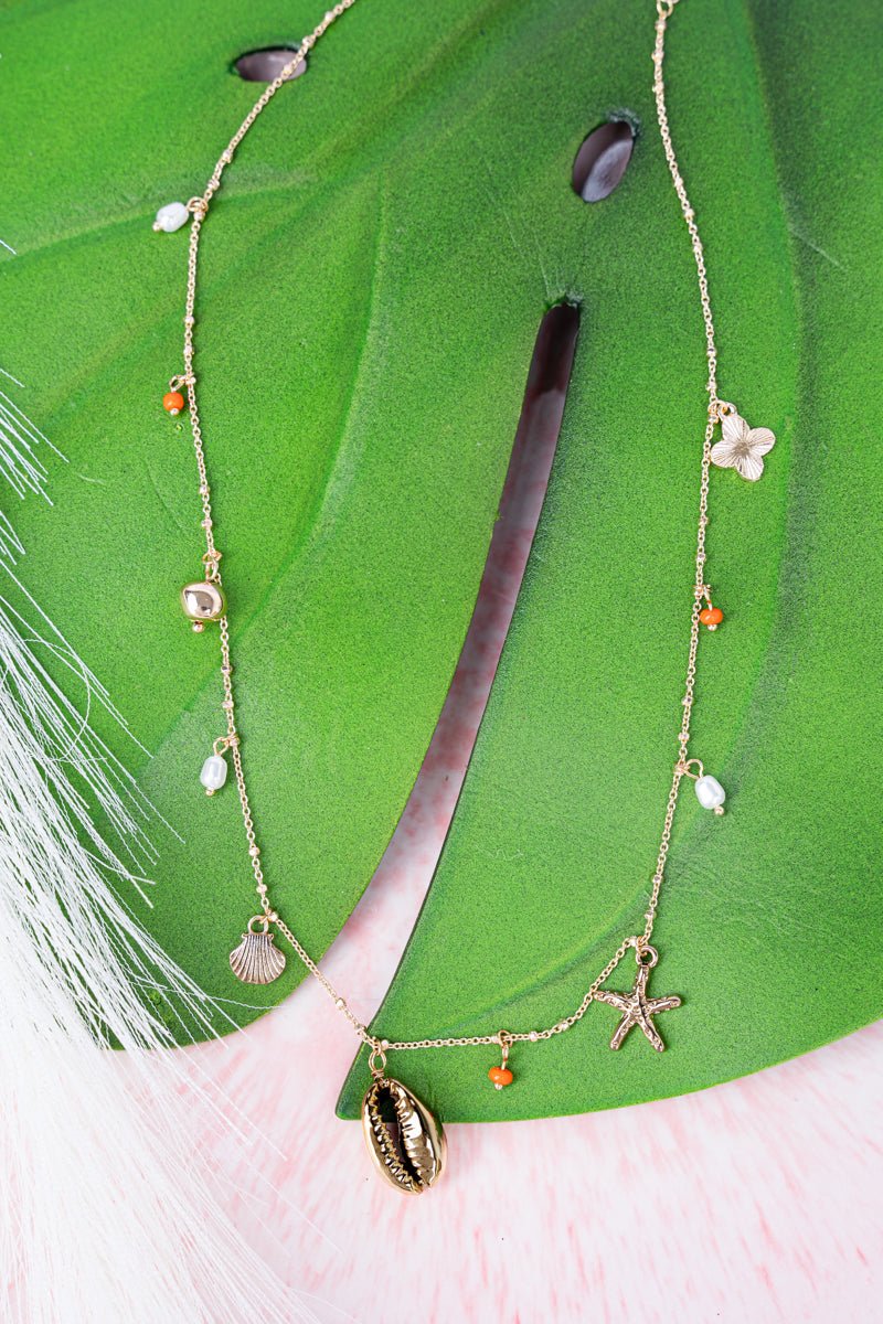 Gorgeous Goldtone Crystal and Pearl Accented Charm Necklace from Crystal Avenue Rockyshore