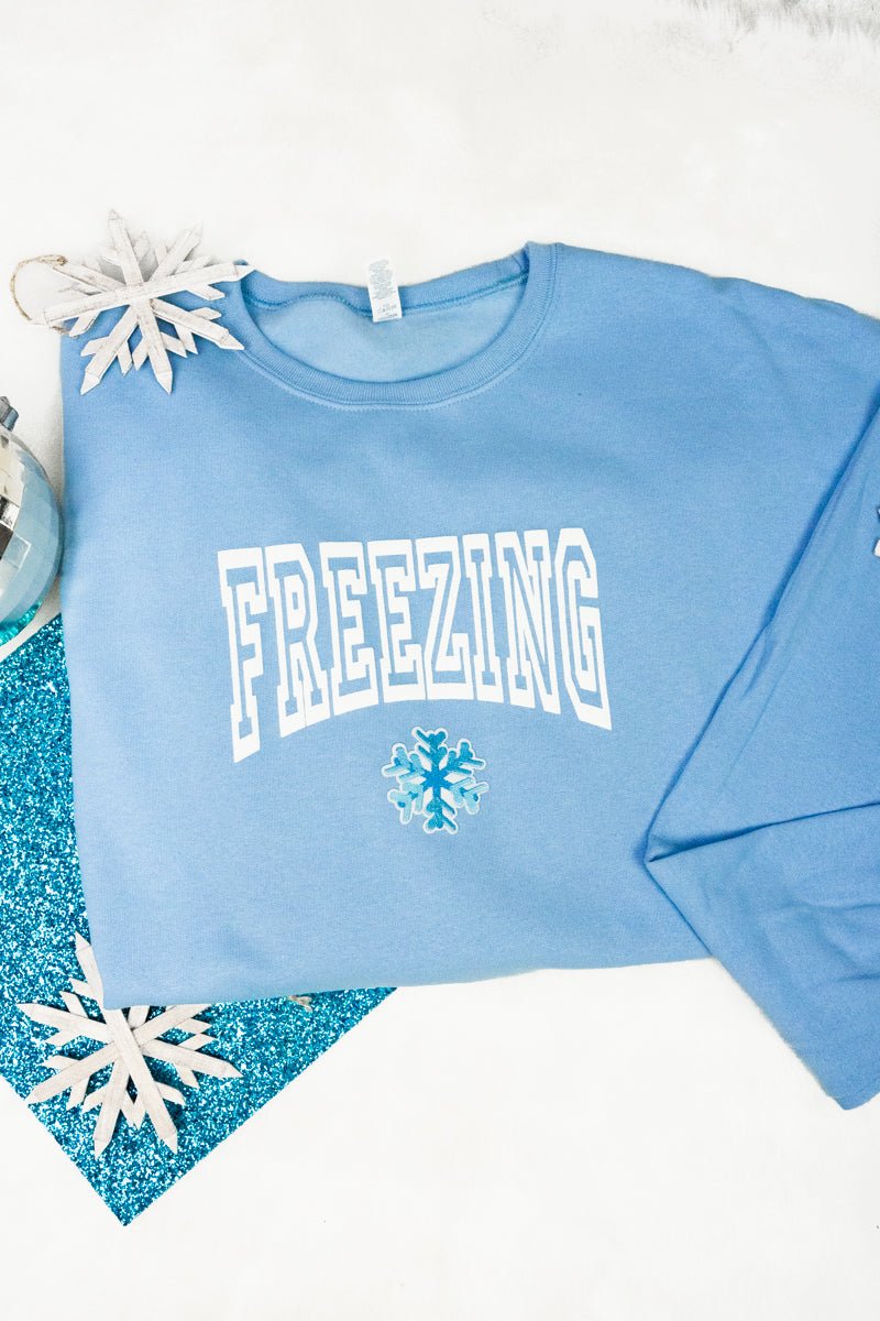 Unisex NuBlend Crew Sweatshirt with Freezing Snowflake Puff Vinyl Patch and Chenille Snowflake Design